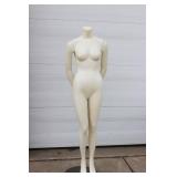 Adult Female Full-Body Headless Mannequin With Metal Base, For Displaying Clothing In Retail Environments. 