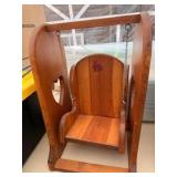 Antique wooden swinging chair decor