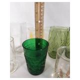 Vintage Decorative Glassware Including Flintstones and Animal Designs, Green Patterned Glasses, and Clear Glass Sets