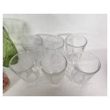 Vintage Decorative Glassware Including Flintstones and Animal Designs, Green Patterned Glasses, and Clear Glass Sets