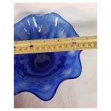 Amber, blue, and red decorative glass bowls