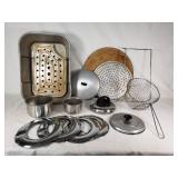 Lot of Kitchen Cookware and Accessories including Roasting Pan, Perforated Trays, Pots, and Lids