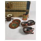 Vintage Tin Toy Tea Set with Decorative Plates and Cups, Stored in a Patterned Trunk