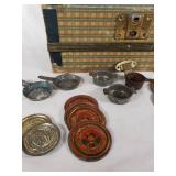 Vintage Tin Toy Tea Set with Decorative Plates and Cups, Stored in a Patterned Trunk