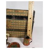 Vintage Tin Toy Tea Set with Decorative Plates and Cups, Stored in a Patterned Trunk