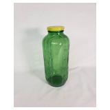 Green Glass Jar with Yellow Lid That Says Water
