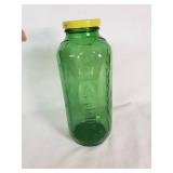 Green Glass Jar with Yellow Lid That Says Water