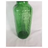 Green Glass Jar with Yellow Lid That Says Water