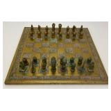 Est. $400.00- $600.00 14" x 14" Vintage Greek Brutalist Bronze Chess Set With Matching Brass Board