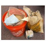 Bucket of sand, bag of gravel