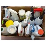 box of cleaning supplies, mostly half bottles