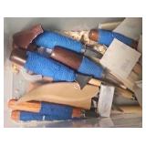 plastic container of wood carving supplies