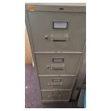 metal filing cabinet with four drawers