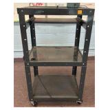 rack with wheels and power strip
