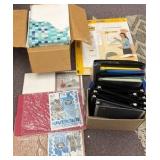lot of paper, Post It notes, paper folders and construction paper
