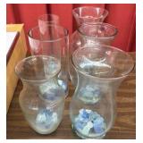 A lot of vases with rocks