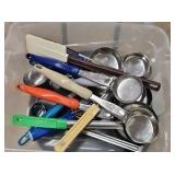 bucket of kitchen utensils