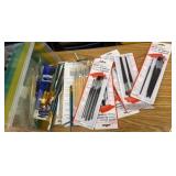 tote of paint brushes, mostly new