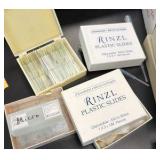 lot of microscope, slides, preparing sets, plastic slides, and carrying cases