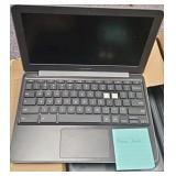 box of broken Chromebooks
