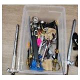 plastic tote of costume accessories