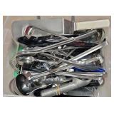 Bucket of kitchen utensils