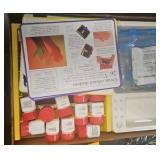 assortment of science kits
