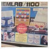 assortment of science kits