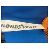 2 Good Year Orange tie-down straps feature heavy-duty metal ratchets for securing cargo. 1100 Pound Rating