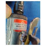 Mac Tools straight air die grinder, often used for grinding, polishing, or deburring.