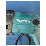 Makita JR3050T corded reciprocating saw, known for its 11-amp motor and durable design.