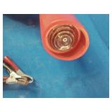 Sunpro Actron CP7504 inductive timing light, used for precise engine timing adjustments.