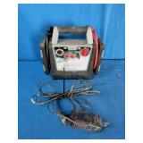 Peak PKC0AS Portable Power System 300, featuring a grey and black housing with a top handle.