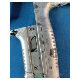 SATAjet 5000 B HVLP spray gun, featuring a compact design with a prominent 1.3mm nozzle and green accent ring.