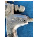 SATAjet 4000 B HVLP spray gun, typically used for high-quality automotive paint finishes.