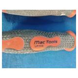 Mac Tools scrappers and tools, which often have distinctive red and black ergonomic handles.