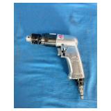 Mac Tools AD540 3/8" reversible air drill, featuring an aluminum housing and a keyed chuck