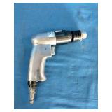 Mac Tools AD540 3/8" reversible air drill, featuring an aluminum housing and a keyed chuck