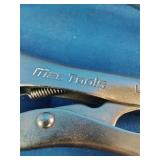 Mac Tools U-shaped locking welding clamps, designed for holding metal panels in place.