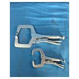 Mac Tools brand locking C-clamps used for securing workpieces.