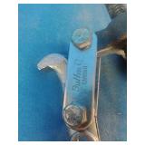 (2) 3-jaw gear pullers used for removing gears, pulleys, and pressed-on components.