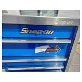 Snap-on Classic Series  KRL1032 triple-bank roll cab tool box in royal blue, equipped with a heavy-duty stainless steel work surface