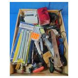 This box contains a variety of miscellaneous hand tools and hardware