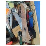 This box contains a variety of miscellaneous hand tools and hardware