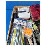 This box contains a variety of miscellaneous hand tools and hardware