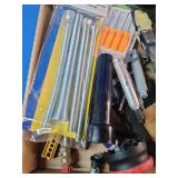 This box contains a variety of miscellaneous hand tools and hardware