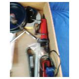 This box contains a variety of miscellaneous hand tools and hardware
