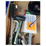 This box contains a variety of miscellaneous hand tools and hardware