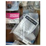 Assortment of fasteners, hardware, and workshop supplies.