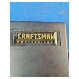 This tool layout features a vintage Craftsman open-end wrench set alongside a Craftsman Professional Speed-Lok Quick Connector Set